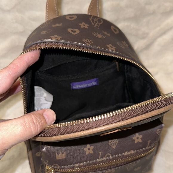 Claire’s Brown Tan LOVE Hearts Jewels Crowns Print Faux Leather Mini Backpack - Picture 8 of 16